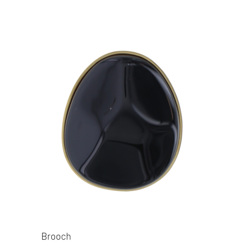 BROCHE DE ACERO CON PIEDRA COLOREADA
