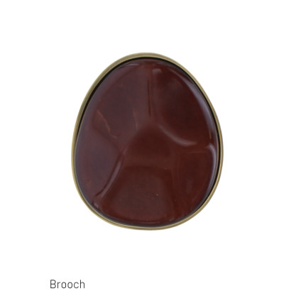BROCHE DE ACERO CON PIEDRA COLOREADA