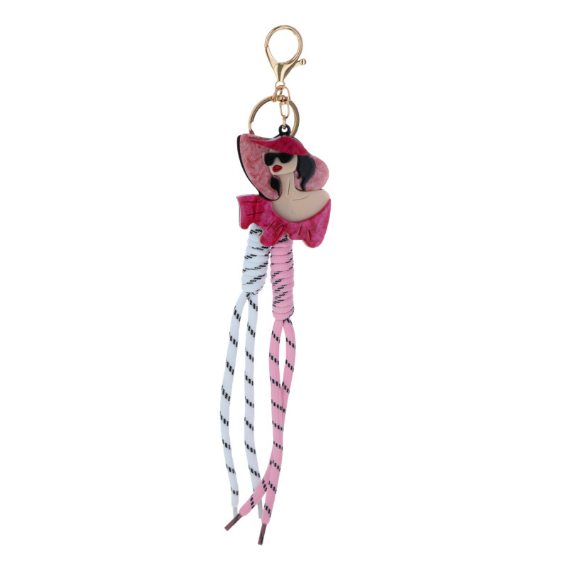 PORTE-CLEFS AVEC DAME Ú LUNETTES ET CHAPEAU