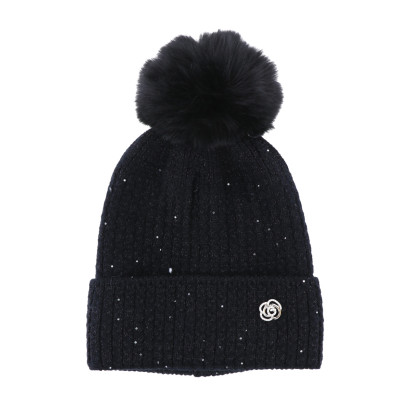 GORRO DE PUNTO CON VUELTA, LUREX Y FLORES
