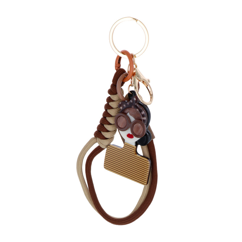 PORTE-CLEFS AVEC DAME, NOEUD PAPILLON ET STRASS