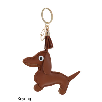 SLEUTELHANGER MET HOND EN KWASTJES