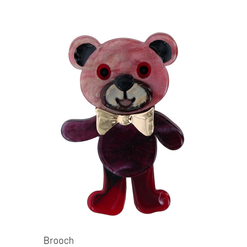 BROCHE MET TEDDY BEER IN HARS EN KNOOP