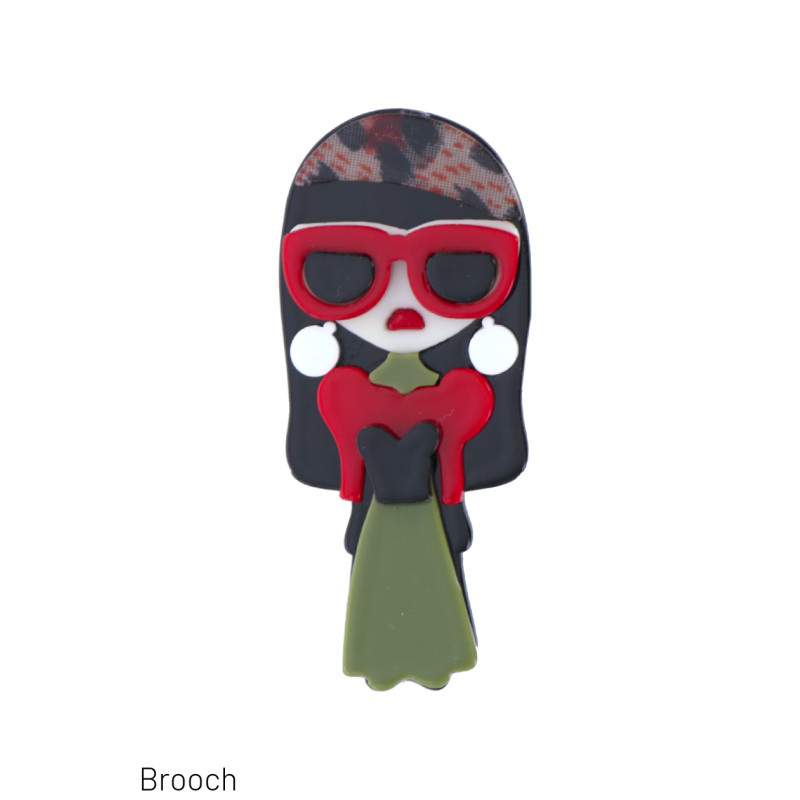 BROCHE MET DAME MET ZONNEBRIL