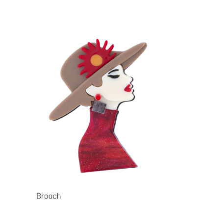 BROCHE MET DAME MET HOED