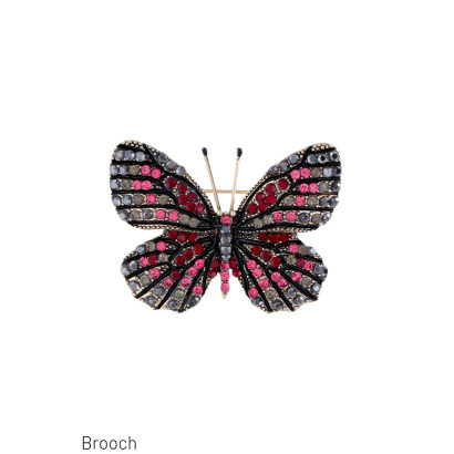 BROCHE AVEC PAPILLION ET PIERRE A FACETTES