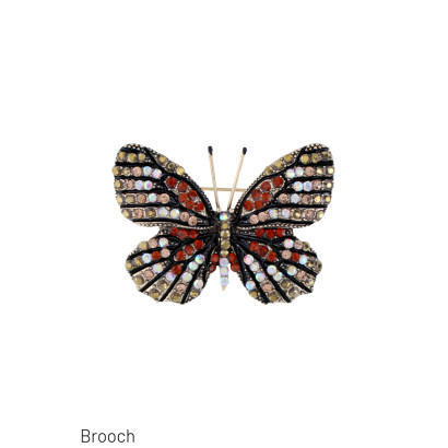 BROCHE AVEC PAPILLION ET PIERRE A FACETTES