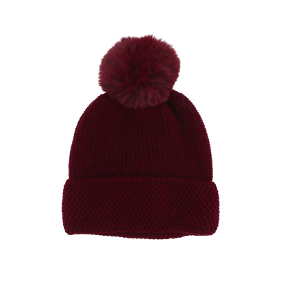 BONNET TRICOTÉ AVEC REVERS ET MOTIF GÉOMÉTRIQUE