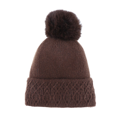 GORRO DE PUNTO CON VUELTA, GEOMETRICO Y POMPÛN