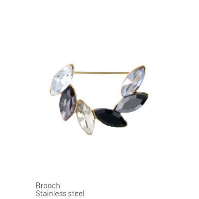 BROCHE EN ACIER FORME RONDE ET FEUILLES